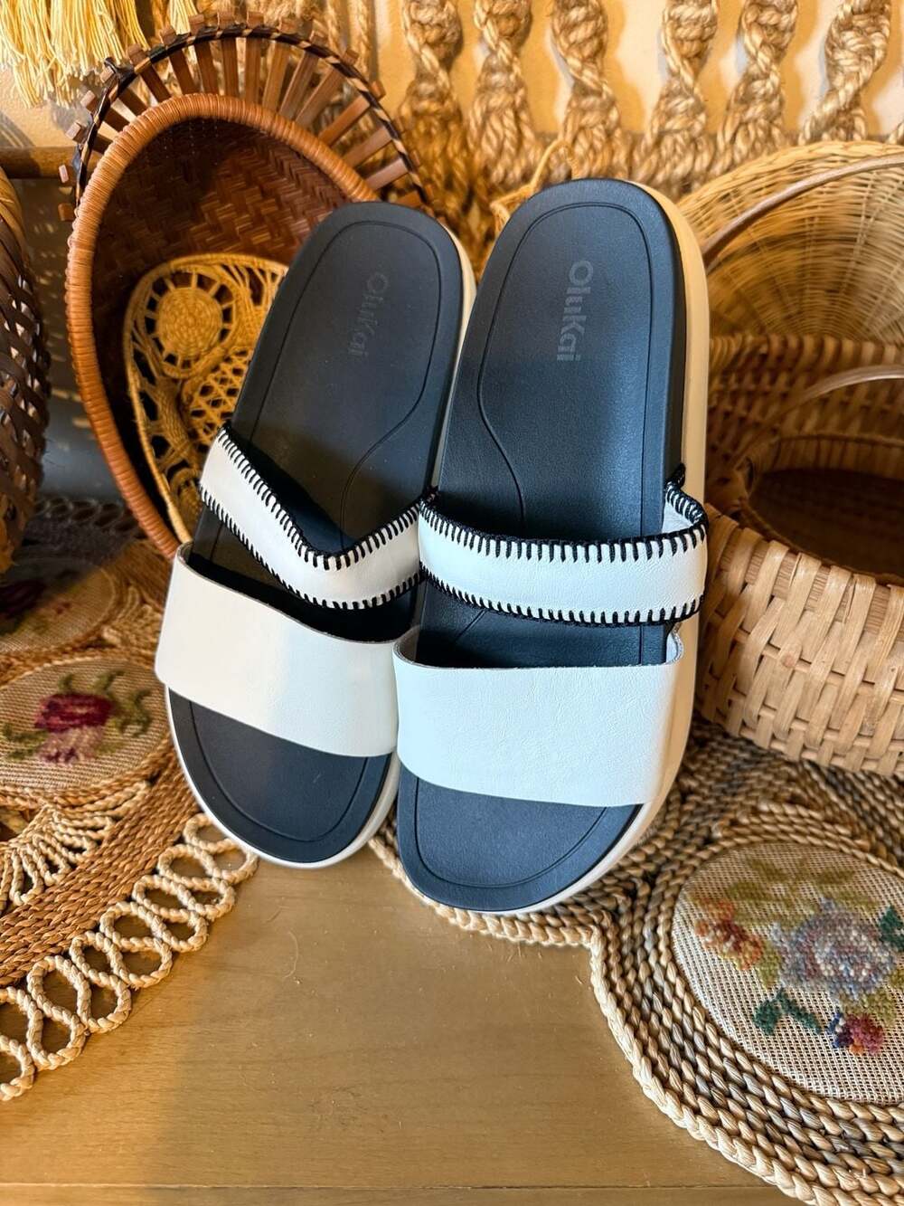 OluKai Pae Women's Leather Slide Sandals in White and Black